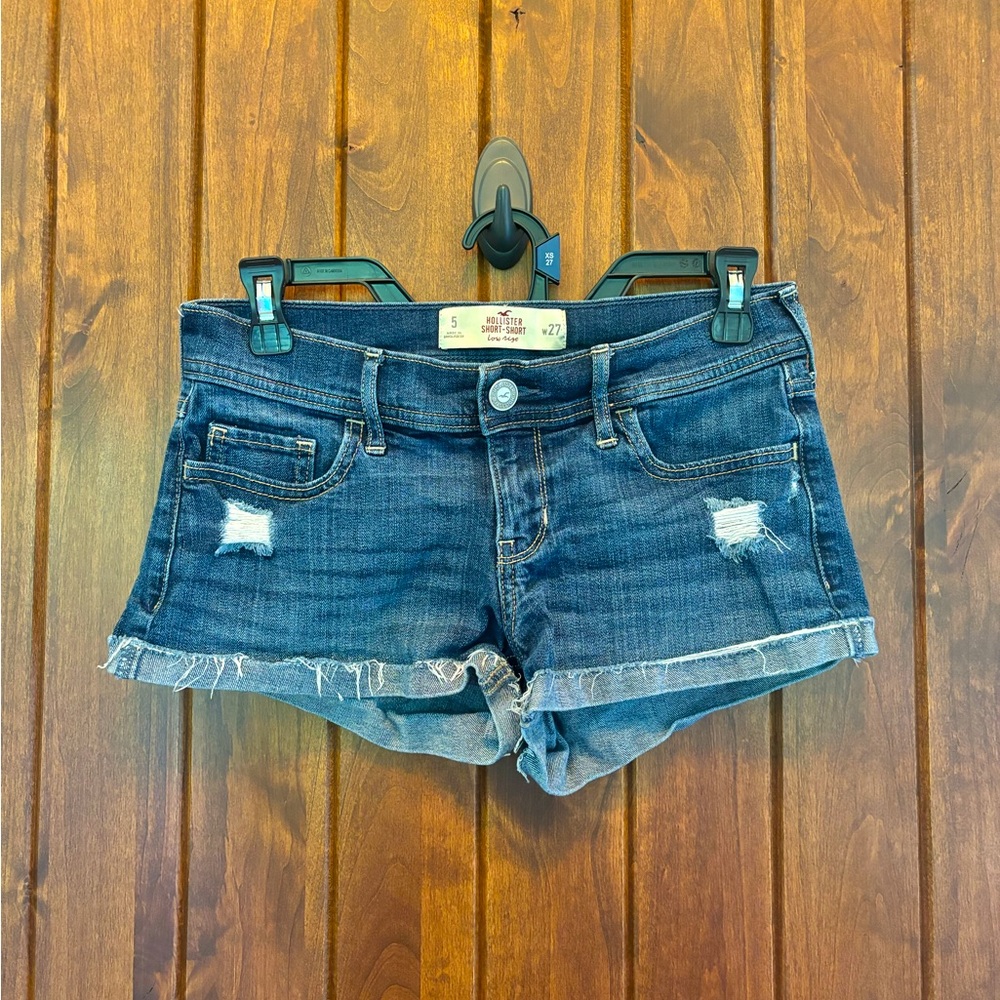 Low-rise ripped dark wash denim short-shorts